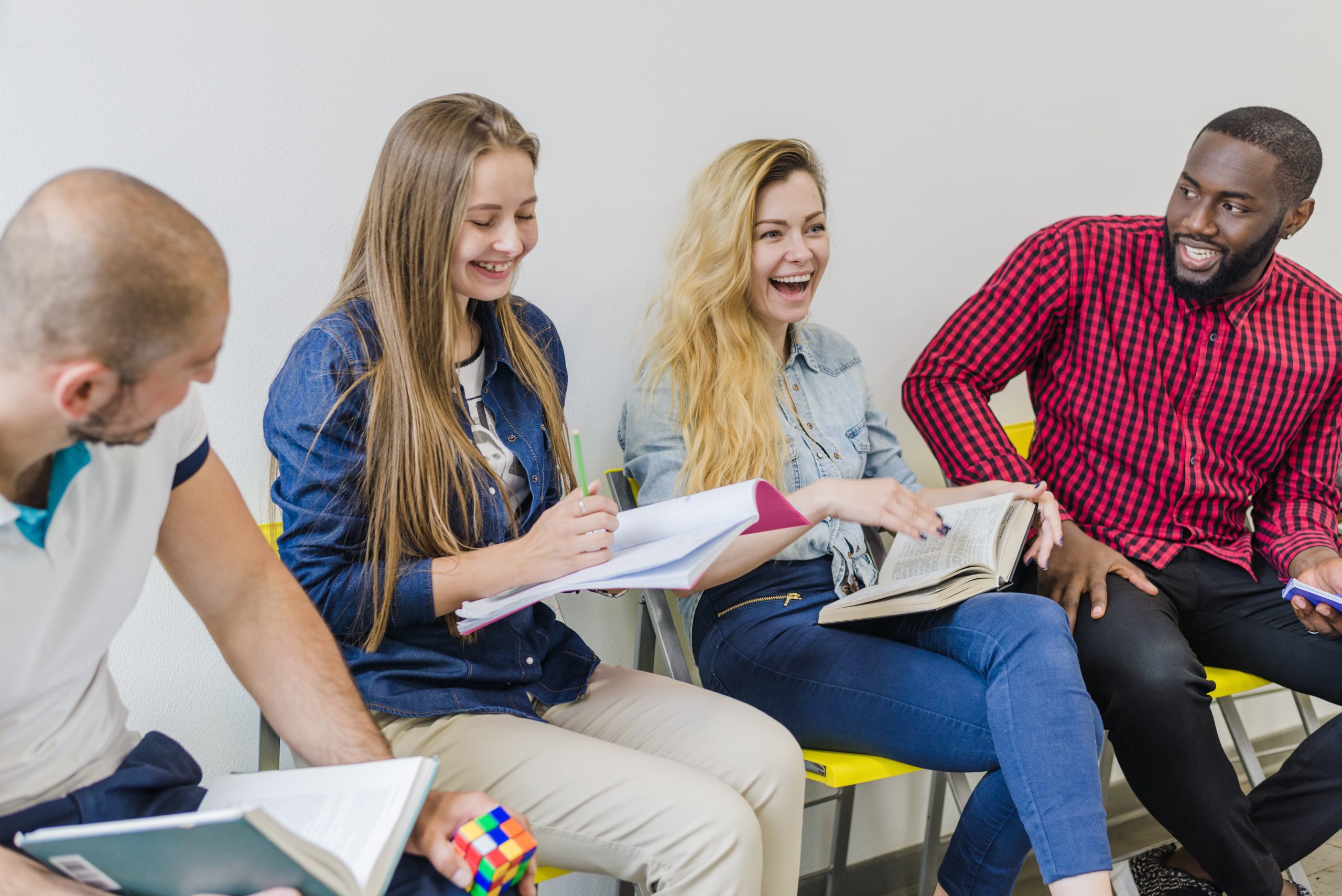 cheerful-students-having-conversation-min